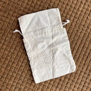 White cotton embroidered drawstring pouch